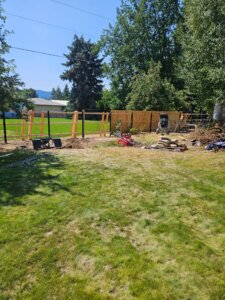 cedar fence being built