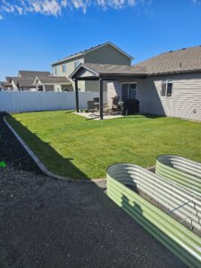 graveled & grass residential landscape